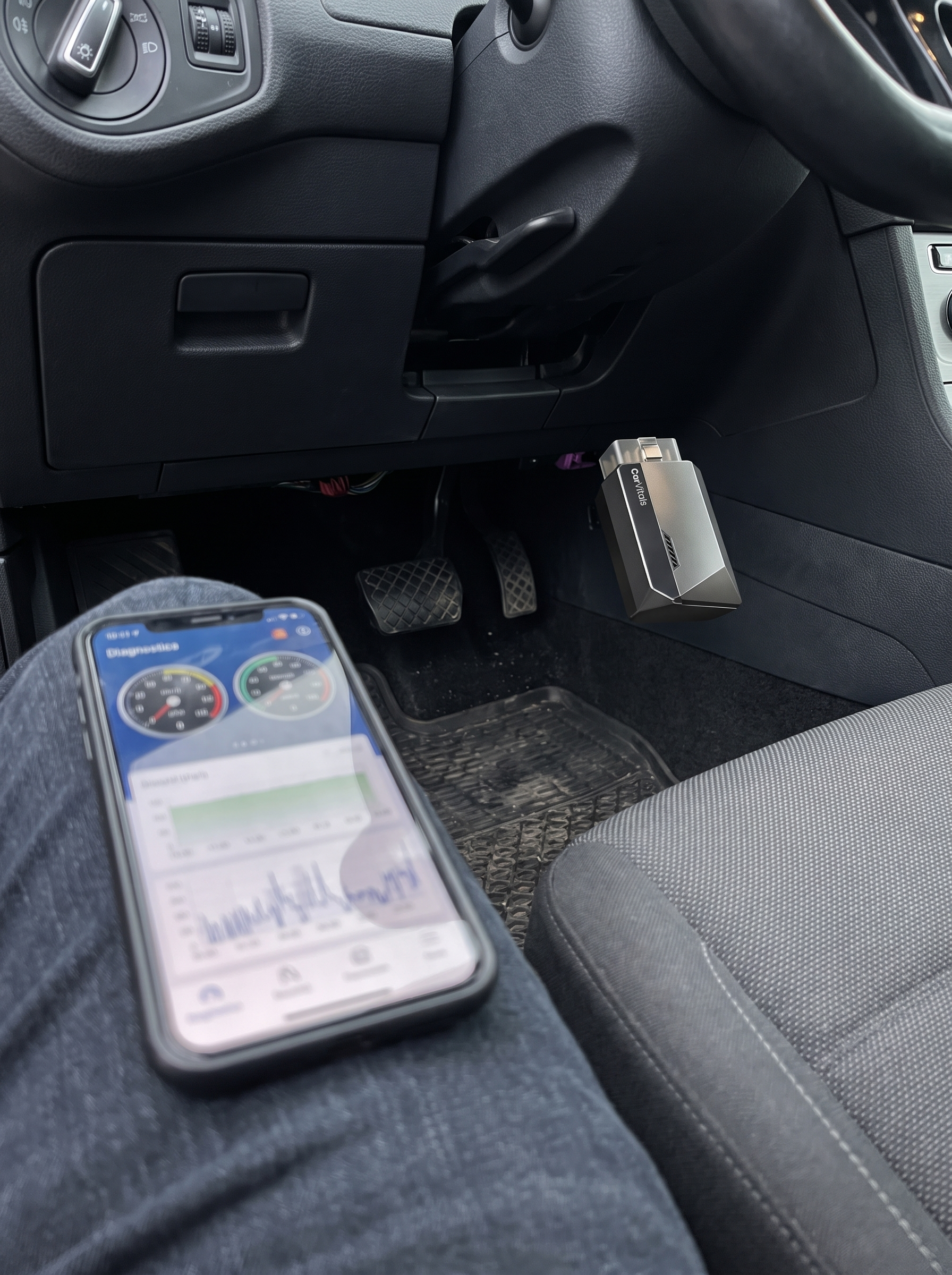 CarVitals connected while driver checks the diagnostics app